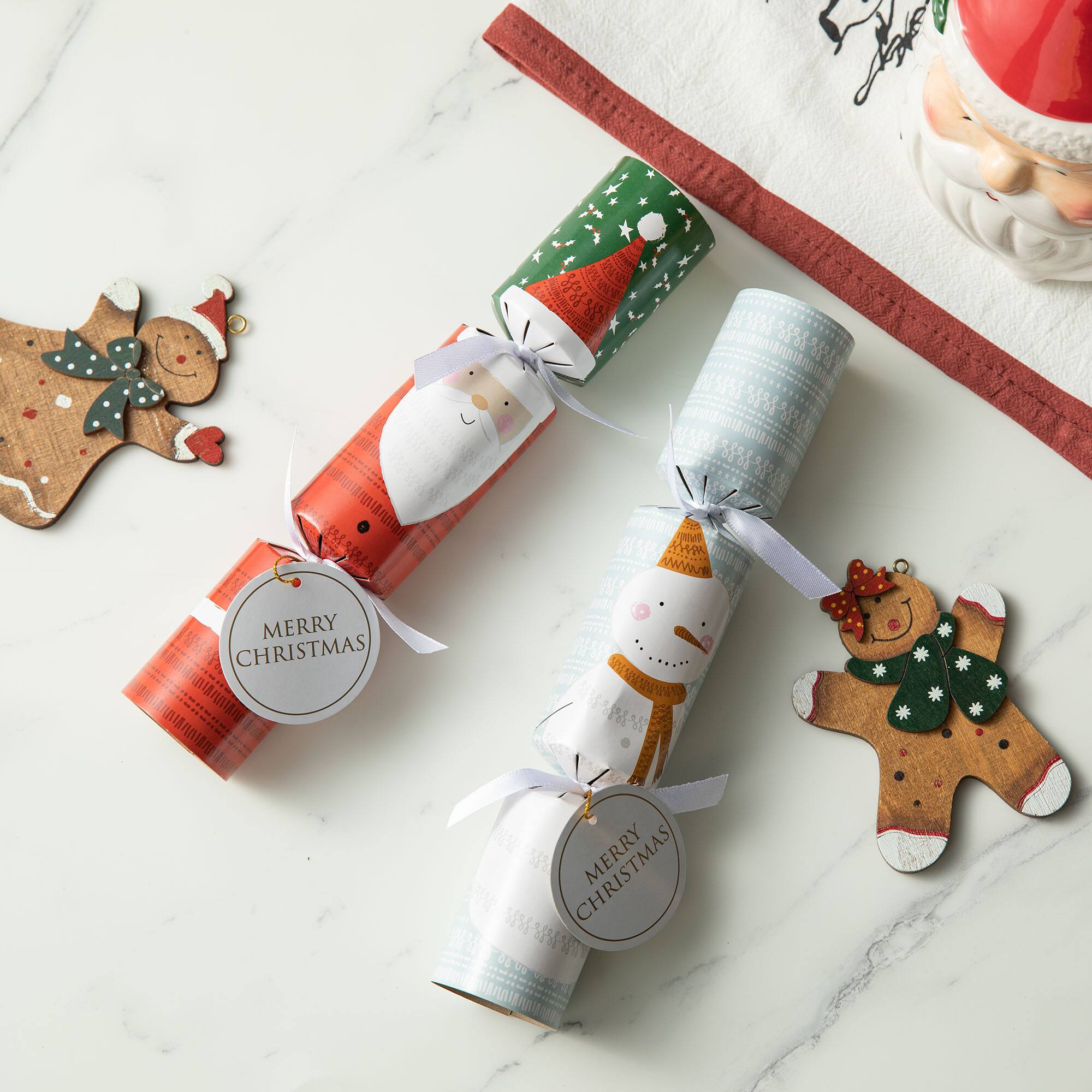 Glitzhome® 10" Christmas Santa & Snowman Party Cracker with Gift Contents, 8ct.